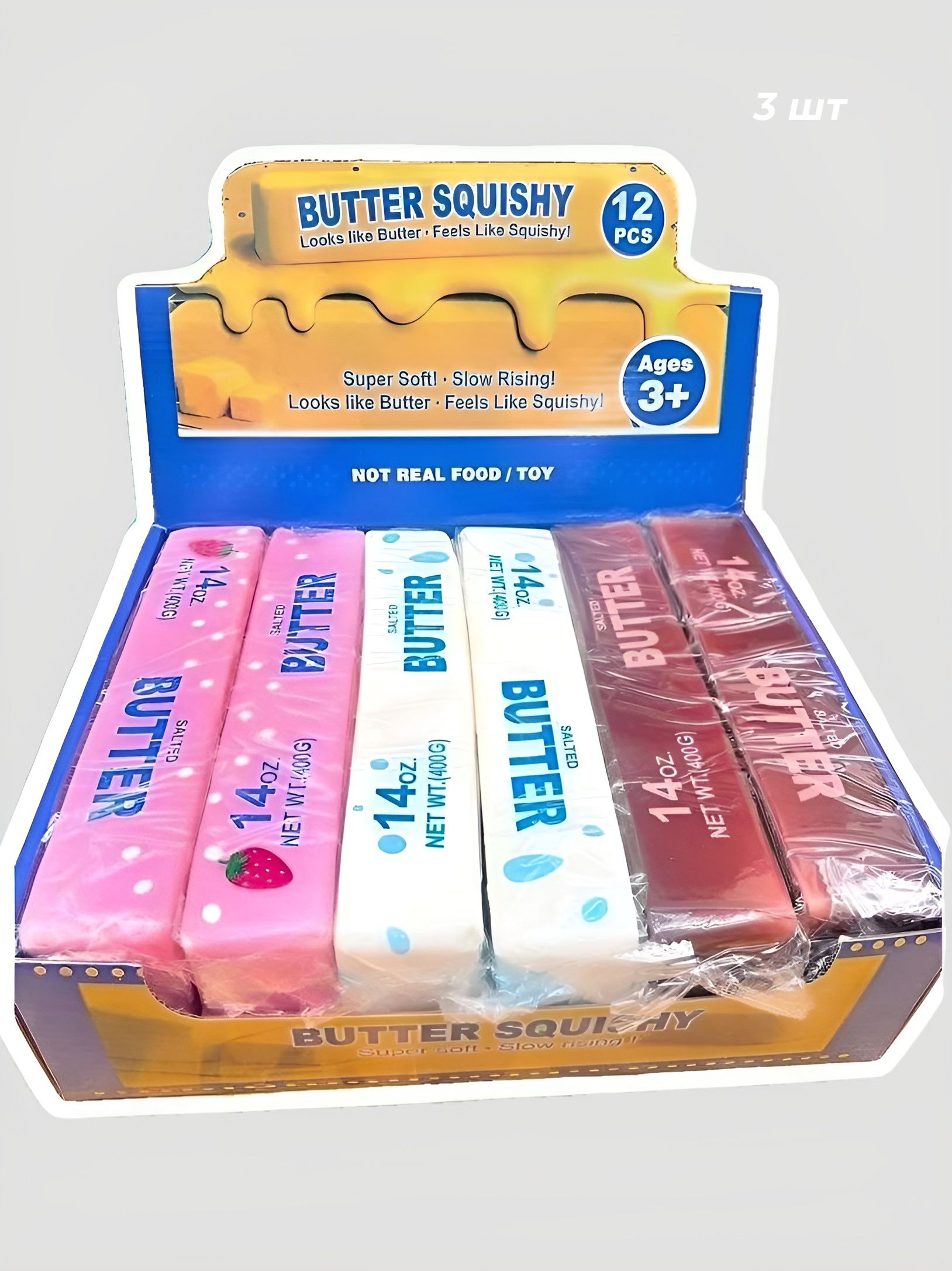 Retail counter display box labeled BUTTER SQUISHY 12 PCS with pink, white, and brown sticks